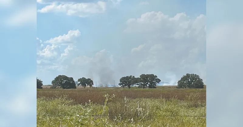 Multiple agencies fight hay bale fire