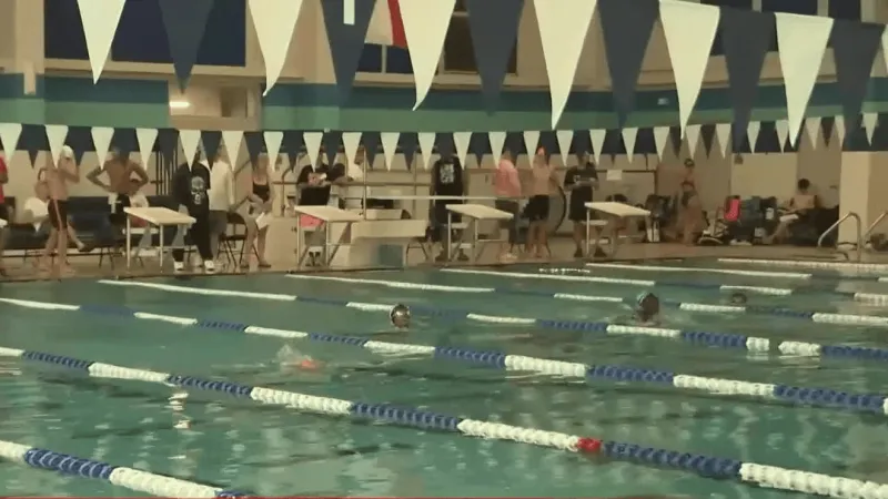 Gray skies, big splashes: 409 Swim turns BISD natatorium meet into family fun