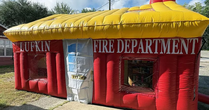 Inflatable safety fire house can show what to do in emergency
