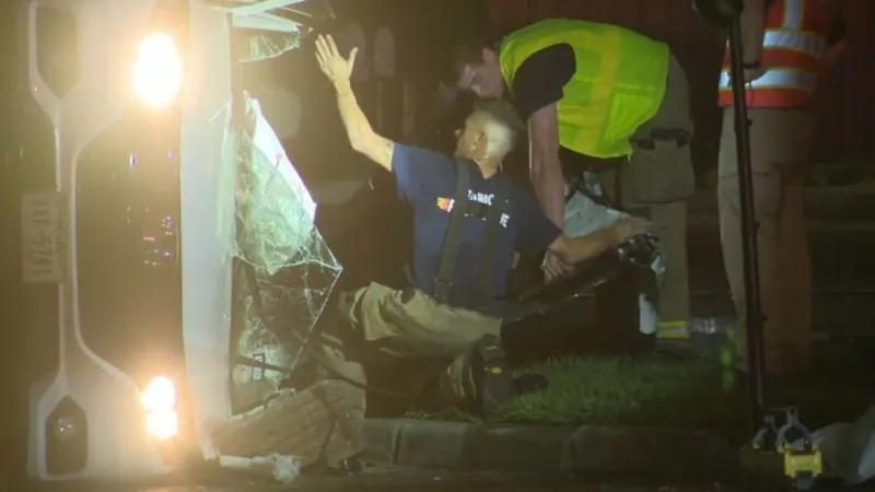 BREAKING: Four injured after collision leaves car on its side