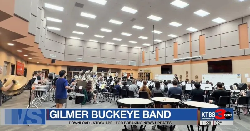 Gilmer Buckeye Band battles heat while preparing for Friday night football