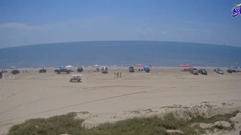 Come on in, the water's fine: Blue sky and surf at Crystal Beach