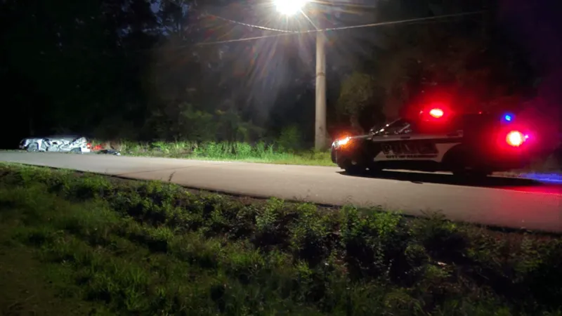 Driver crashes into car and slams into tree, officers work to save life