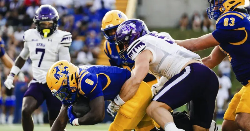 Lumberjacks axe Cowboys in 100th season opener