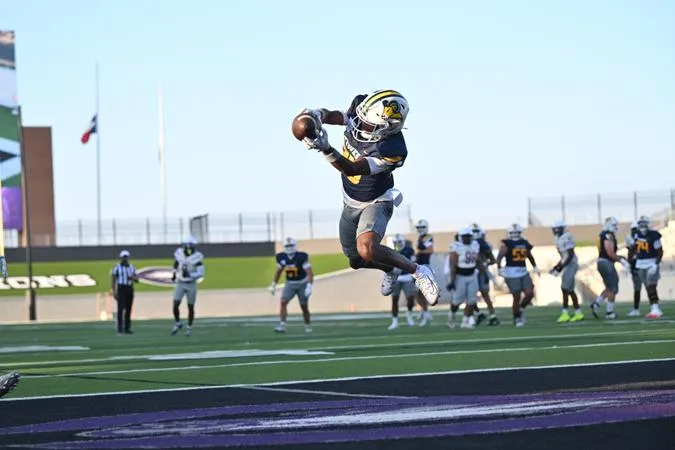 FB: Rams Cruise to Victory in Conference Opener, 58-20