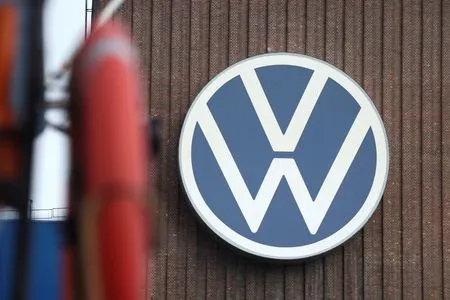 Volkswagen cuts outlook on $11.5 billion one-off hit
