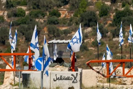 Palestinian gunman shoots dead Israeli in the West Bank, soldiers kill motorist