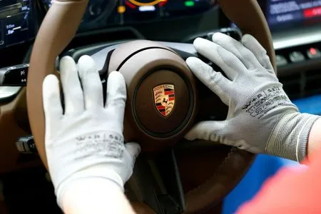 Analysis-Porsche's decline from crown jewel to millstone for parent Volkswagen