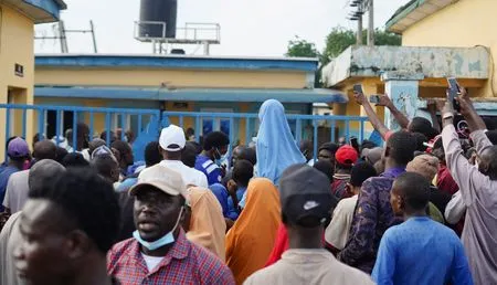 Nigerian residents protest as hundreds remain captive a month after mass kidnapping