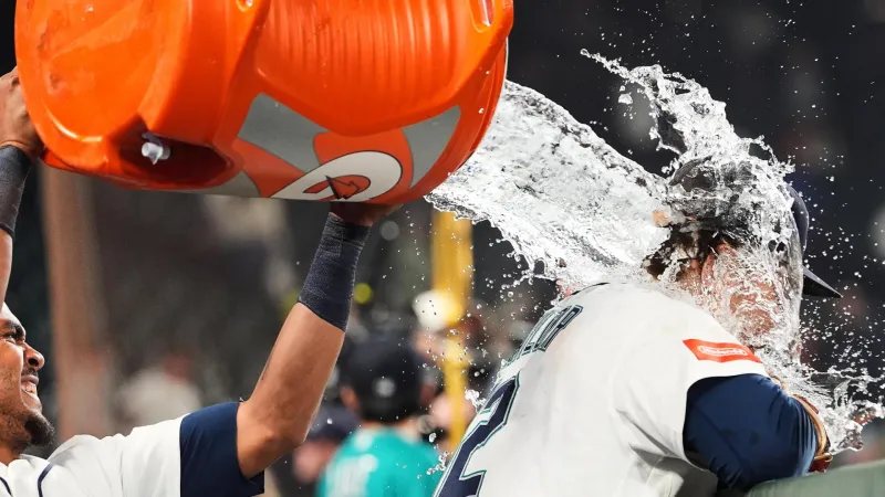 Mariners rally past Astros 6-5 in 10 innings to keep faint playoff ...