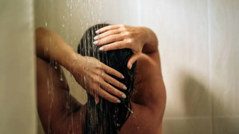 2 accused of threatening to release nude shower photos in dispute over money indicted