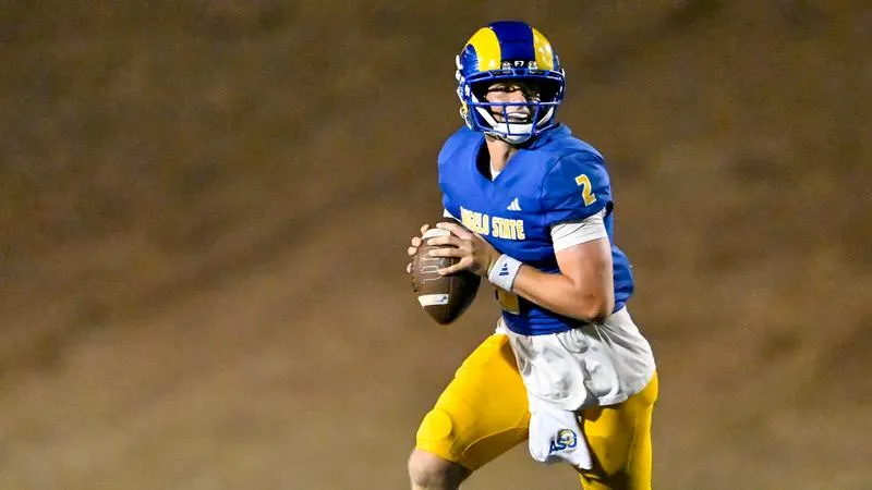 Arp Tosses Four TDs as Football Upsets No. 17 Western Oregon in Overtime