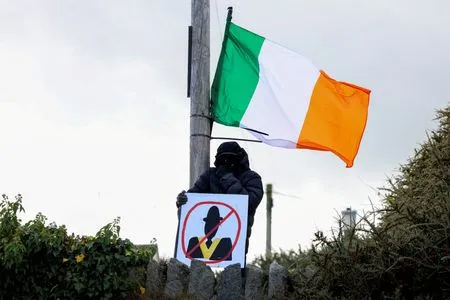 Britain seeks compromise over blocked Orange Order march in Northern Ireland