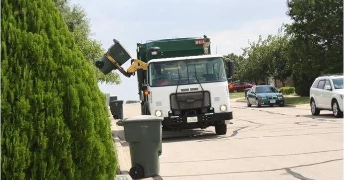 Trash aboard City truck catches fire Monday