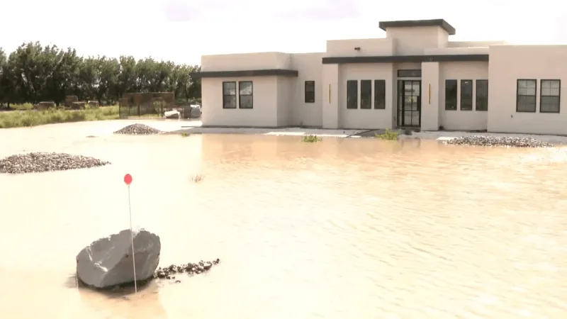 Neighbor's early warning helps Las Cruces family flee fast-rising floodwaters