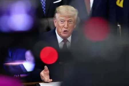 Democratic lawmakers seek probe of US government ads featuring Trump