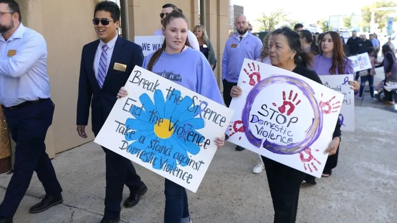 Domestic violence awareness walk honors victims, supports survivors