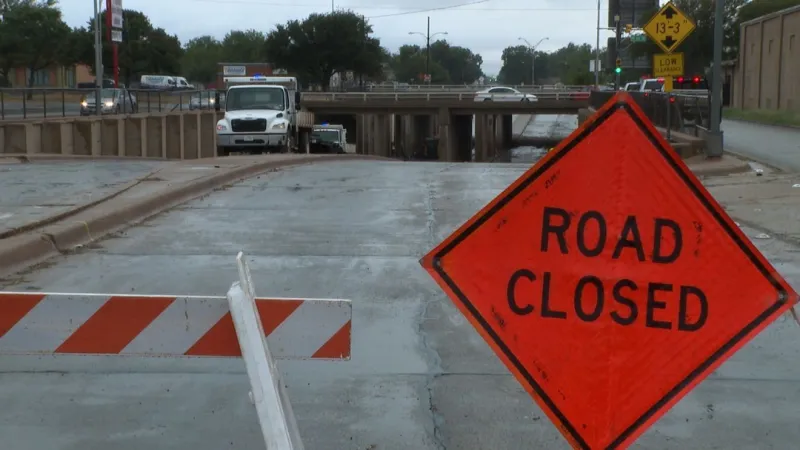 Flash flooding traps woman in underpass, closes North First Street over 24 hours