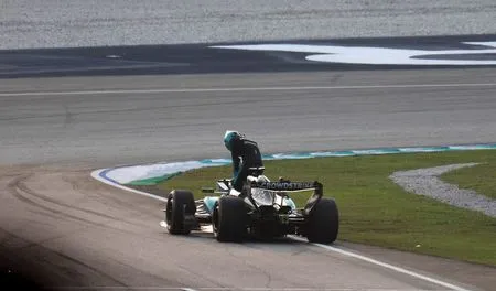 Motor racing-Russell's championship dreams hit by cruel power unit failure in Sepang