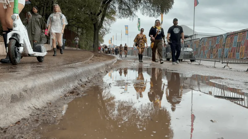 ACL fans brave rain and mud for final day of Weekend One