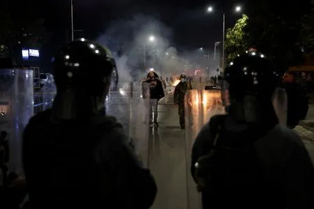 Protesters clash with police over Kosovo war crimes court law