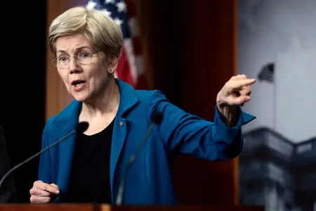 US Senator Warren presses federal housing director to cooperate with probe