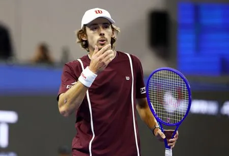 Tennis-De Minaur heads to Shanghai for scans after Beijing retirement