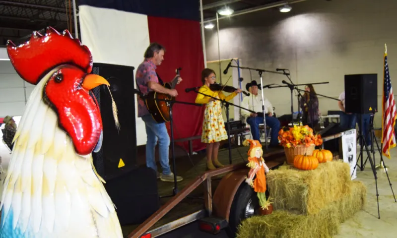 Rain dampens festival, sip & stroll a bit hit