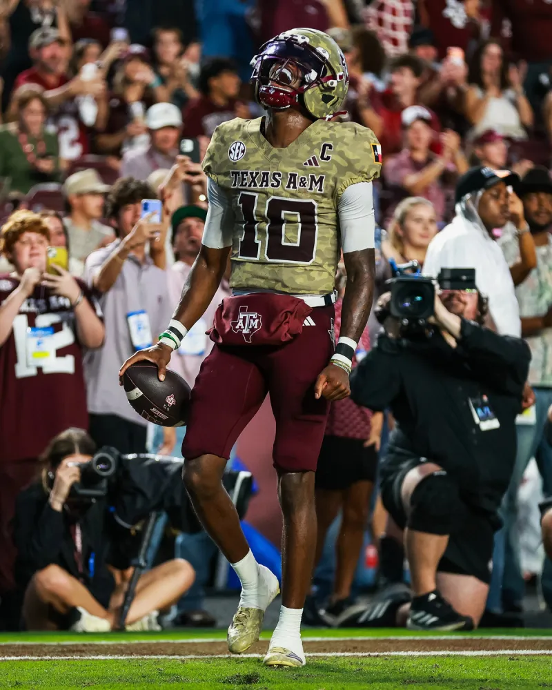 Aggies rout Arkansas 34-7, notch 800th program victory