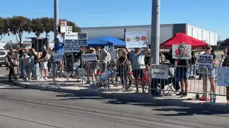 Protesters gather near Freeman Coliseum ahead of Trump rally event