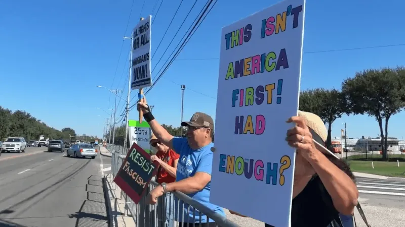 Protesters gather outside Freeman Coliseum during Trump's San Antonio visit