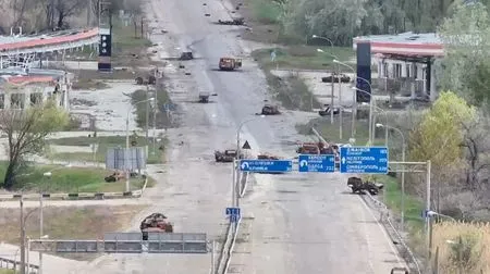 People in Russian-occupied Ukrainian town risk 'road of death' to get food