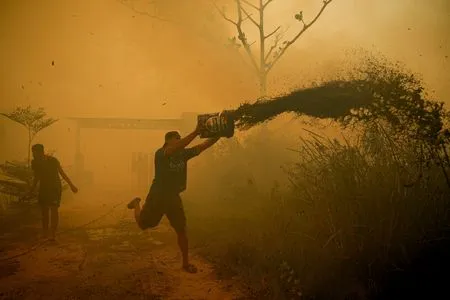 Wildfires spread into residential areas in Indonesia's Bangka Belitung, destroying over 300 houses