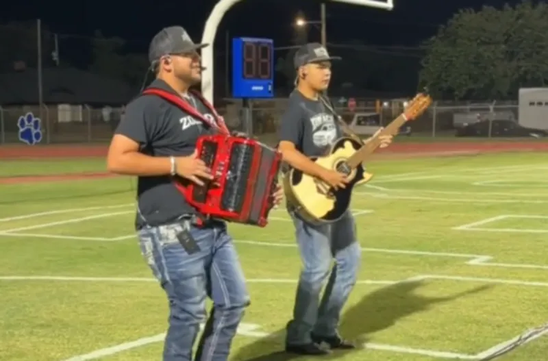 Grupo Zodiacal Performs After High School Football Game