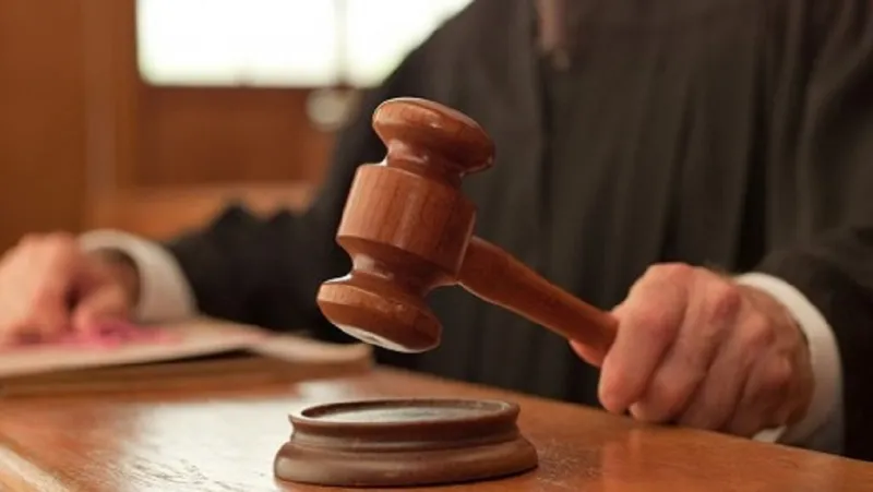 FOUR SENTENCED IN DISTRICT COURT