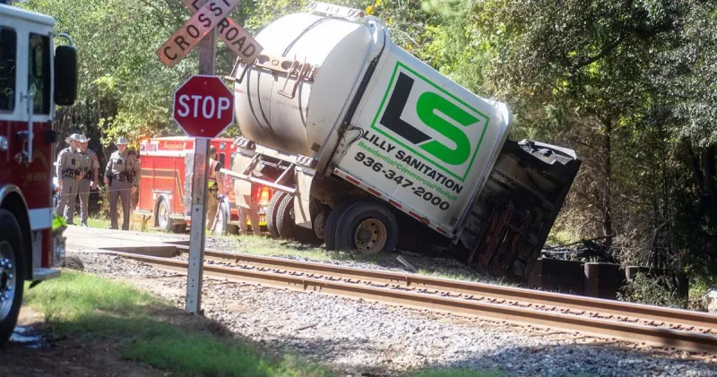 Sanitation worker killed in crash with train