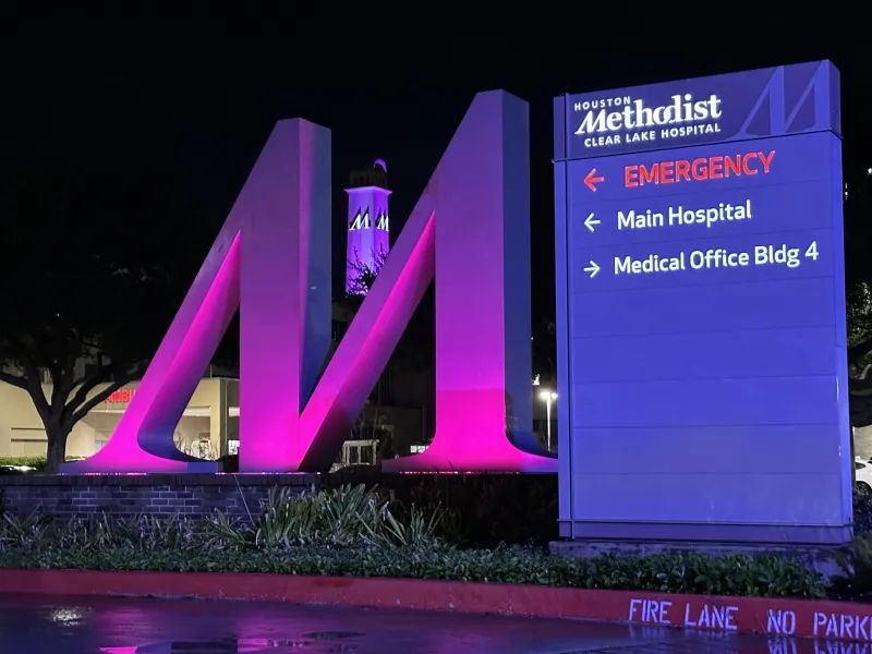 Houston Methodist Clear Lake Hospital is illuminated in pink throughout October in observance of Breast Cancer Awareness Month