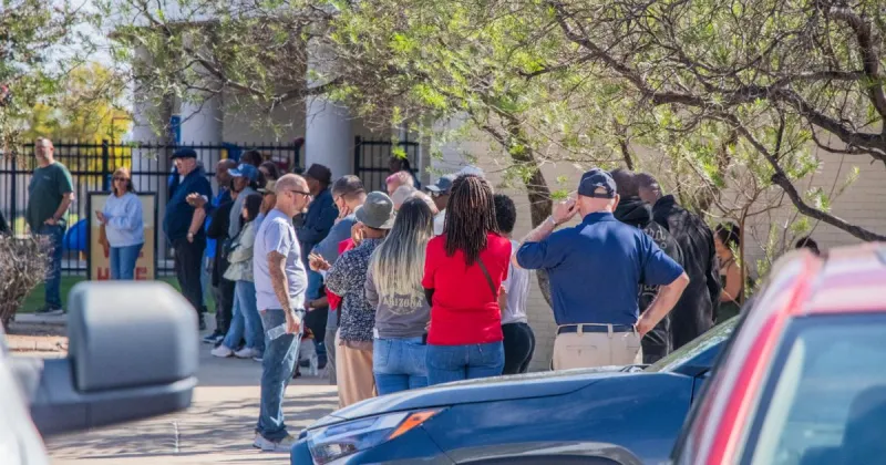 Voters at Killeen's Lions Club Park greeted by long lines as early voting begins