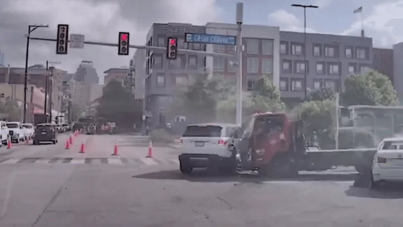 CAUGHT ON CAMERA: DPS pursuit ends in crash near downtown, suspect arrested