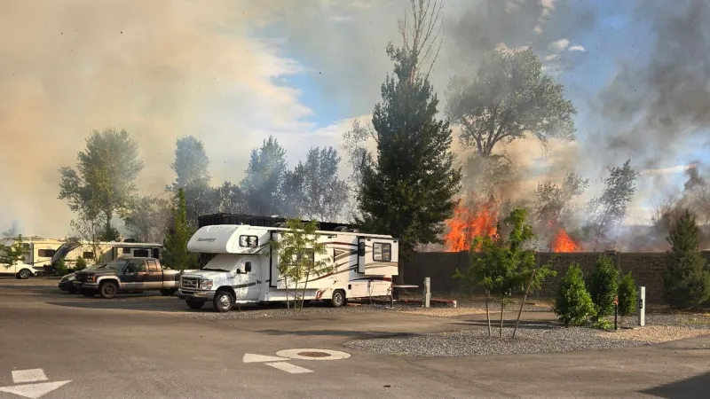 Fire near RV park forces evacuations, temporary I-84 closure in Weber County