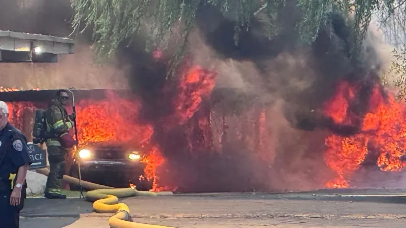 PHOTOS: Massive fire at Millcreek apartments started by lawnmower in grassy field