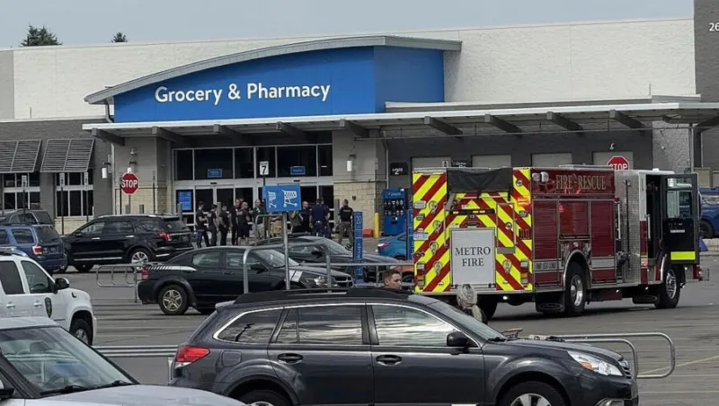 A man accused of stabbing 11 people at a Walmart is in Michigan authorities' custody