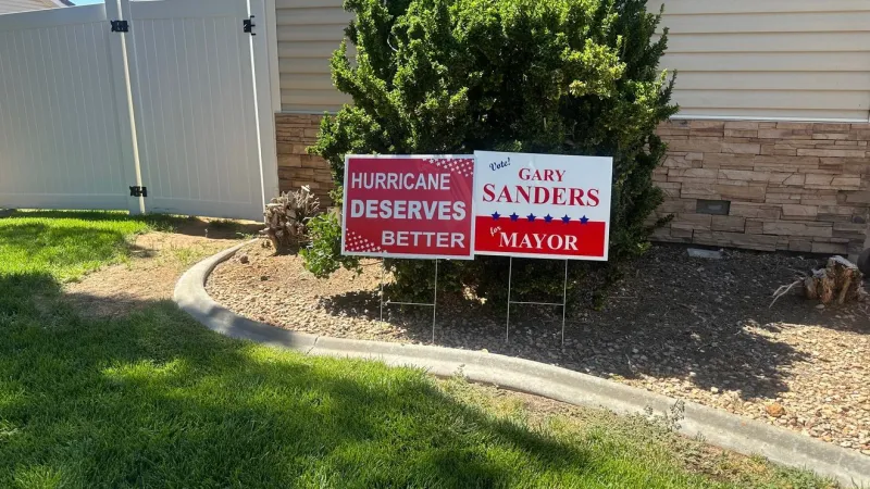 Political slogan posted on signs becomes center of Hurricane mayoral controversy