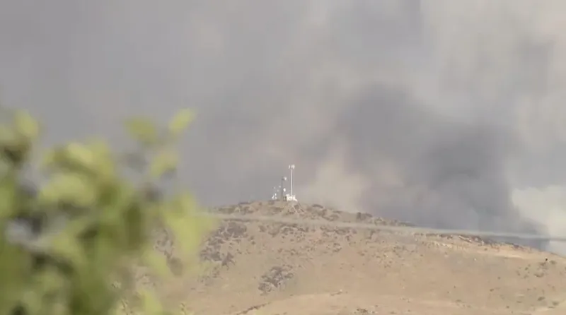 Monroe residents watch as fire burns beloved mountain