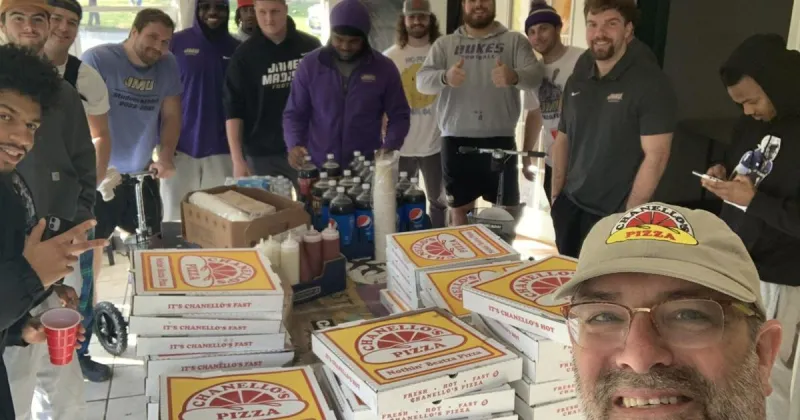 JMU can't play for a conference title today, so a famous fan threw the Dukes a pizza party