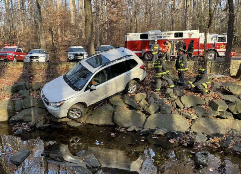 Two rescued after SUV nearly plunges into creek at Long Branch Nature Center