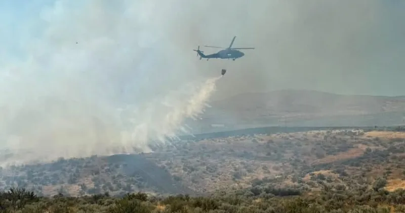 Firefighters contain brush fire started by vehicle crash on I-82 on Friday