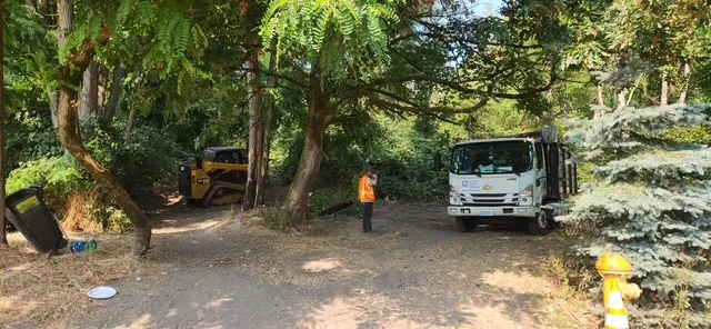 City crews clearing encampment behind West Seattle's Home Depot