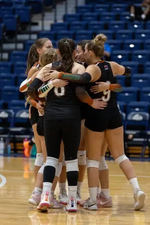 Wolves Fall in Five-Set Battle, Browning Makes History