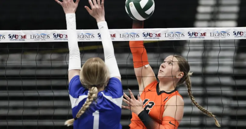 Davis sweeps Prosser for Michelle Howell's first win as coach
